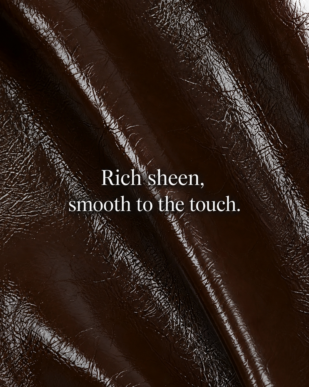 Glossy dark brown synthetic leather texture with a smooth finish